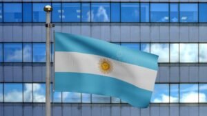 edificio corporativo moderno con bandera argentina